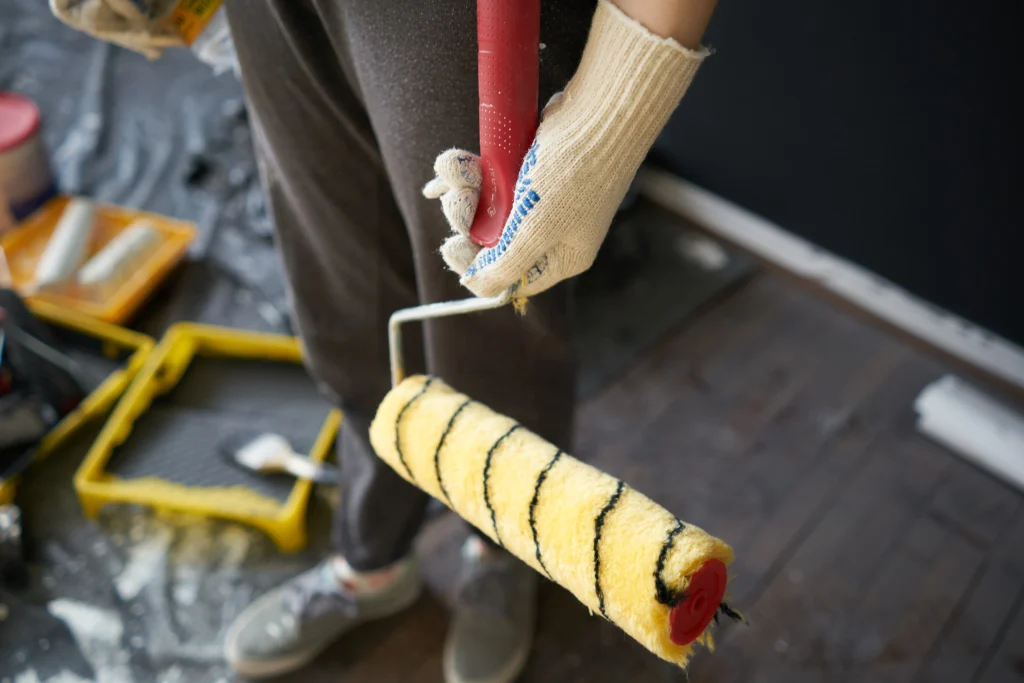 house painting project with roller and yellow pain 2026 09 23 21 51 46 utc
