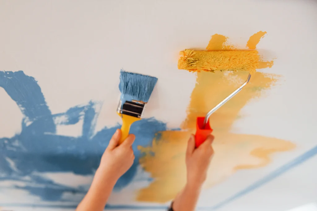 blue and yellow paint being applied to ceiling 2026 09 24 07 31 08 utc