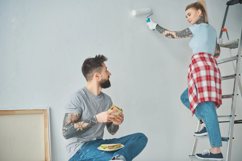 couple renovating apartment and eating a sandwich 2026 09 21 03 03 54 utc